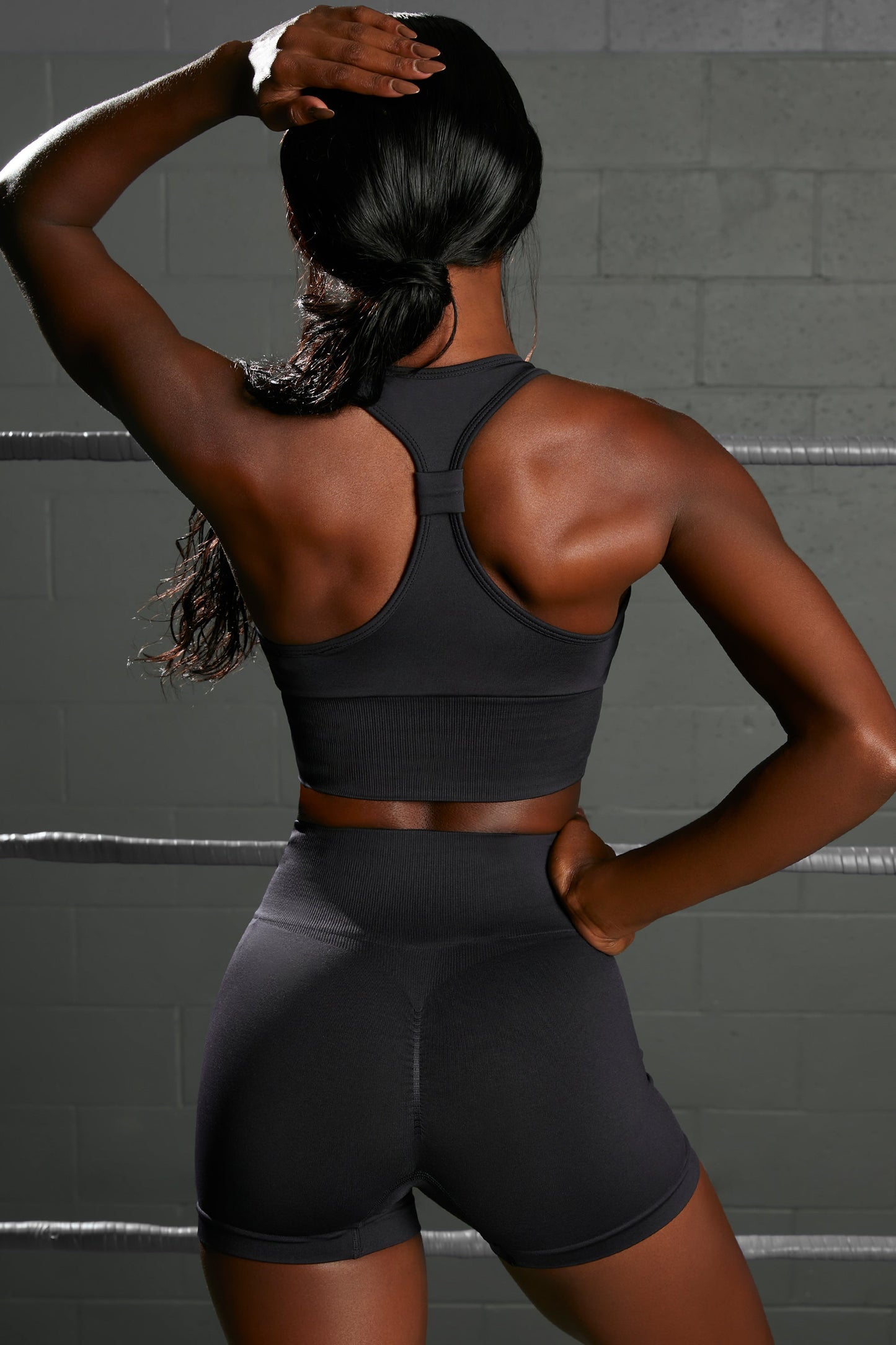 Racer Knot Back Seamless Crop Top in Black